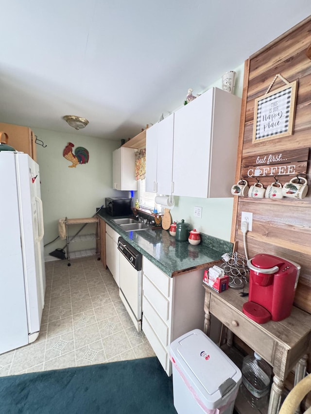 4589 Prices Bridge Ln, Walterboro, SC 29488 - kitchen featuring white appliances, white cabinets, and dark countertops