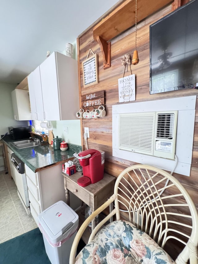 4589 Prices Bridge Ln, Walterboro, SC 29488 - kitchen featuring white cabinetry, dark countertops, and dishwasher