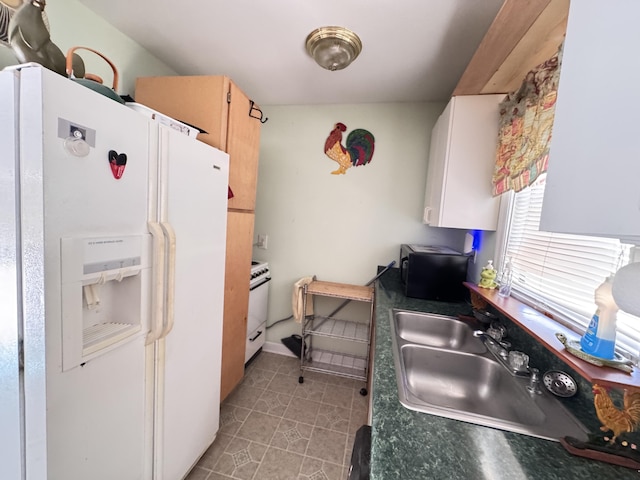 4589 Prices Bridge Ln, Walterboro, SC 29488 - kitchen with white appliances and dark countertops