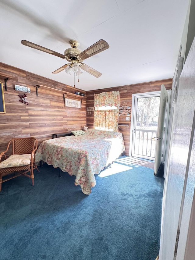 4589 Prices Bridge Ln, Walterboro, SC 29488 - bedroom with access to exterior, wood walls, carpet, and ceiling fan