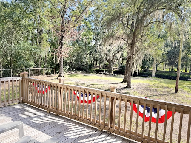 4589 Prices Bridge Ln, Walterboro, SC 29488 - deck featuring view of wooded area and a yard