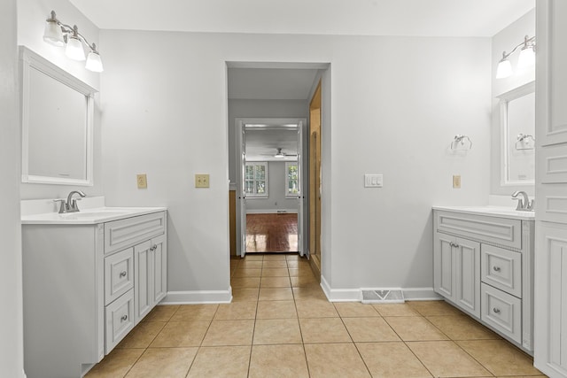 206 Chaussee Blvd, Summerville, SC 29483 - full bathroom featuring two vanities, tile patterned flooring, baseboards, and ceiling fan