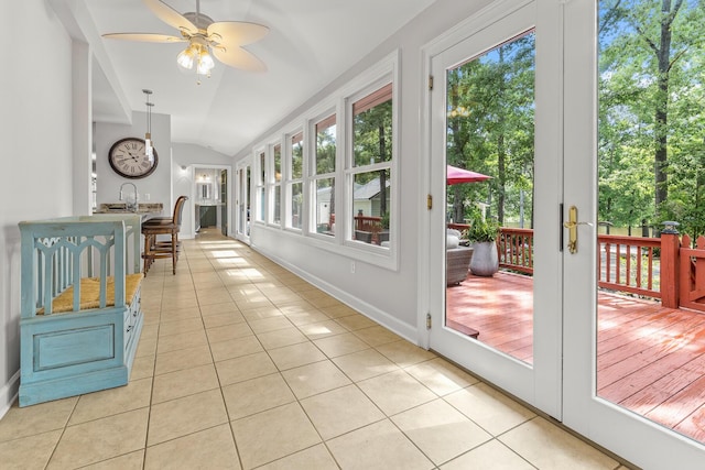 206 Chaussee Blvd, Summerville, SC 29483 - sunroom / solarium featuring tile patterned floors, vaulted ceiling, a deck, healthy amount of natural light, and baseboards