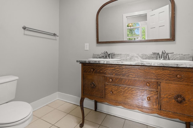 206 Chaussee Blvd, Summerville, SC 29483 - bathroom featuring toilet, double vanity, baseboards, and tile patterned flooring