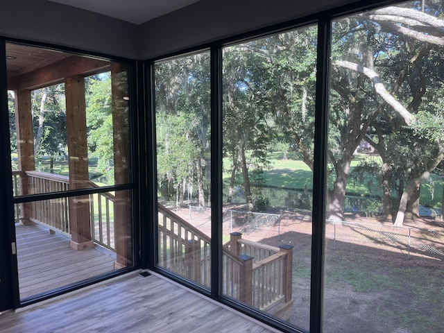 entryway with hardwood / wood-style flooring and plenty of natural light