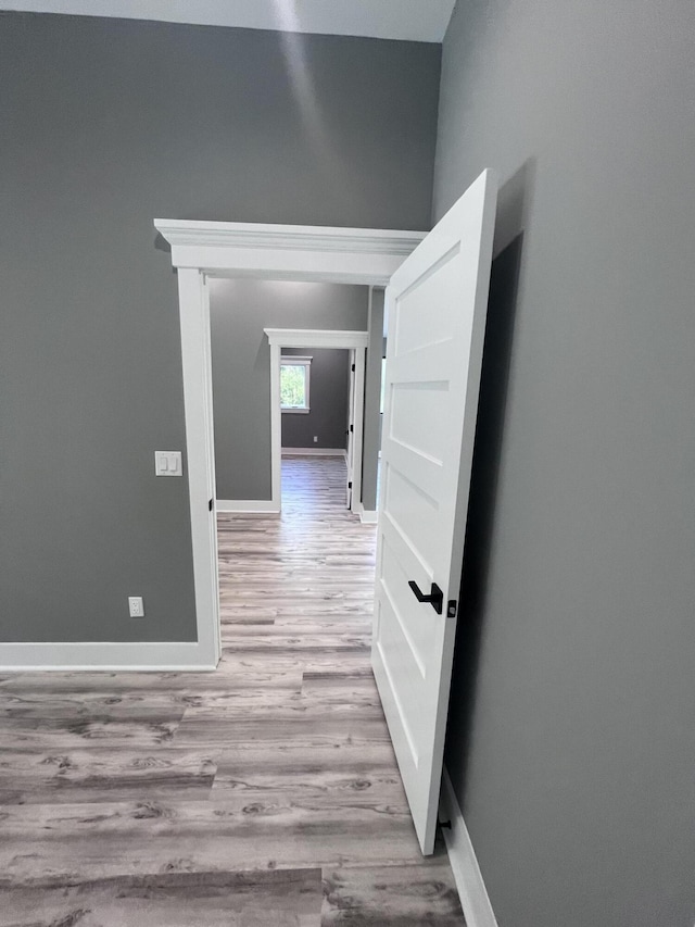 corridor featuring light wood-type flooring