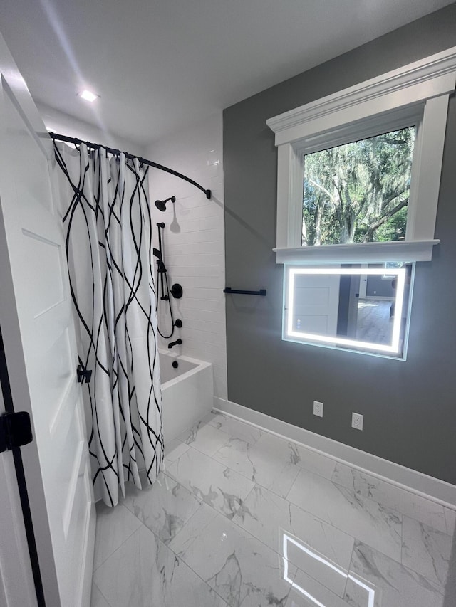 bathroom featuring shower / tub combo