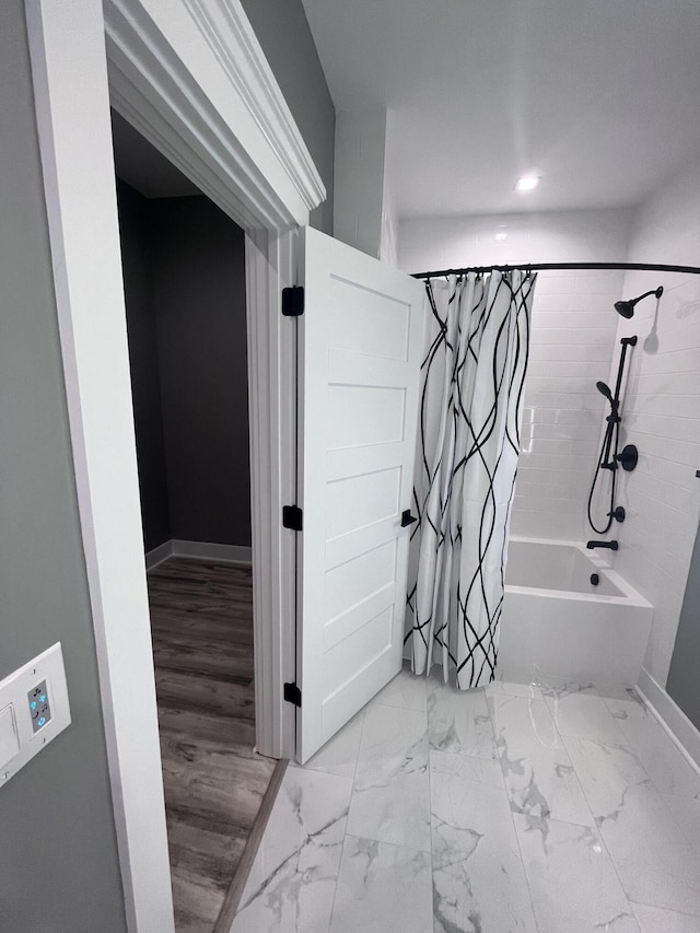 bathroom with shower / bath combo