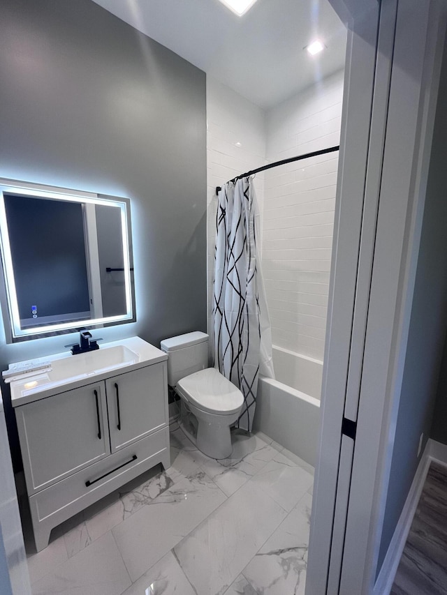 full bathroom with vanity, toilet, and shower / bath combo