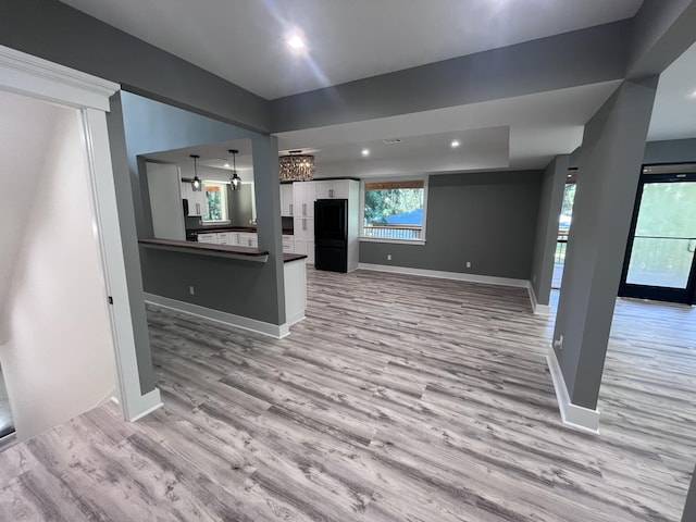 living room featuring light wood-type flooring