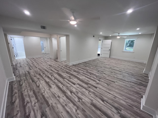 empty room featuring hardwood / wood-style flooring and ceiling fan