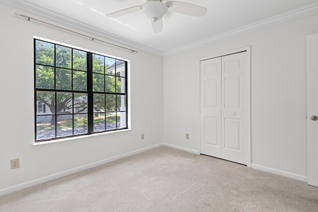 633 Stono Edge Dr, Charleston, SC 29412 - unfurnished bedroom featuring multiple windows, crown molding, light colored carpet, a closet, and ceiling fan