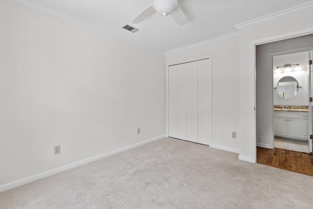 633 Stono Edge Dr, Charleston, SC 29412 - unfurnished bedroom with carpet flooring, crown molding, a closet, and a ceiling fan