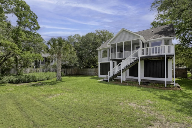 633 Stono Edge Dr, Charleston, SC 29412 - back of house with a sunroom, stairs, roof with shingles, and a deck