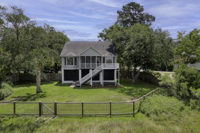 633 Stono Edge Dr, Charleston, SC 29412 - rear view of house featuring a sunroom and a fenced backyard