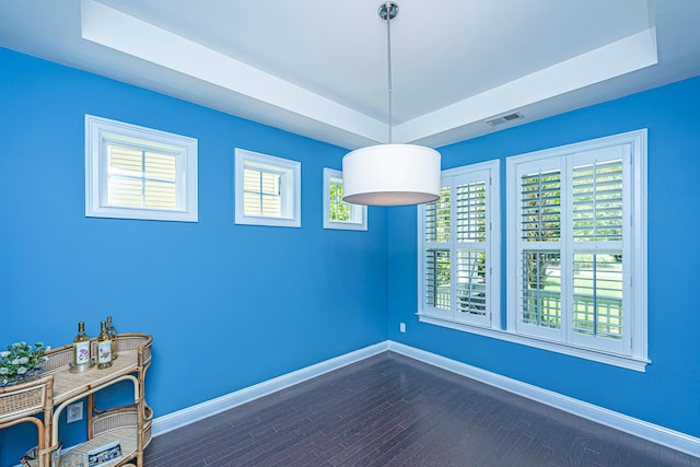 1721 Wellstead St, Mount Pleasant, SC 29466 - empty room with a tray ceiling and dark wood finished floors