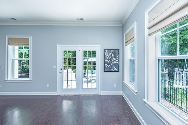 1721 Wellstead St, Mount Pleasant, SC 29466 - doorway to outside featuring crown molding and dark wood-type flooring