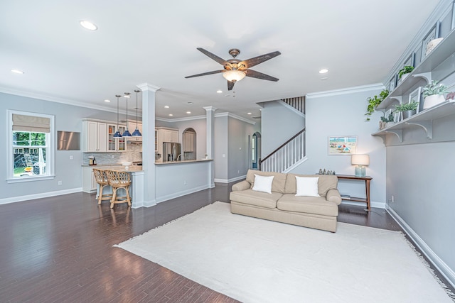 1721 Wellstead St, Mount Pleasant, SC 29466 - living room featuring a ceiling fan, recessed lighting, decorative columns, dark wood-type flooring, and stairway