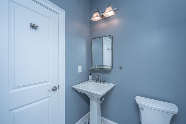 1721 Wellstead St, Mount Pleasant, SC 29466 - bathroom featuring toilet and baseboards