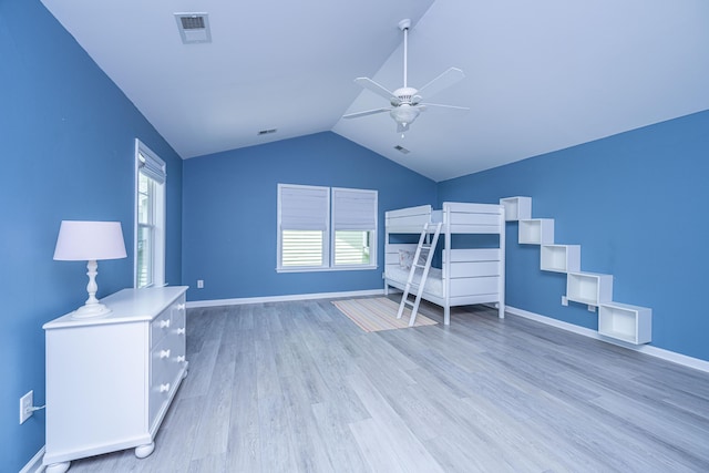 1721 Wellstead St, Mount Pleasant, SC 29466 - bedroom with light wood-style floors, vaulted ceiling, and ceiling fan