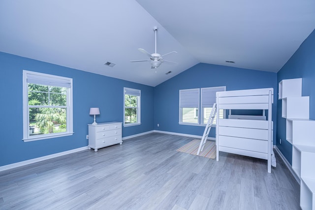 1721 Wellstead St, Mount Pleasant, SC 29466 - unfurnished bedroom featuring wood finished floors, lofted ceiling, and ceiling fan
