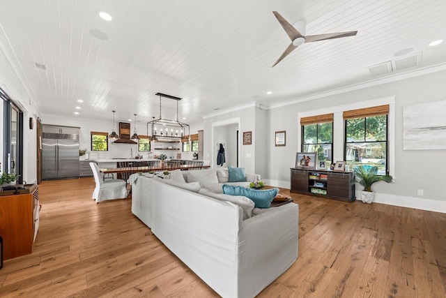 living room with ceiling fan, wood ceiling, light hardwood / wood-style floors, and crown molding