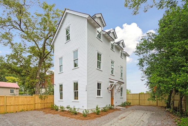 view of property exterior featuring a patio area