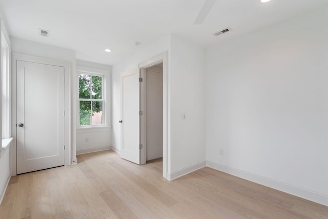 unfurnished bedroom with light hardwood / wood-style floors