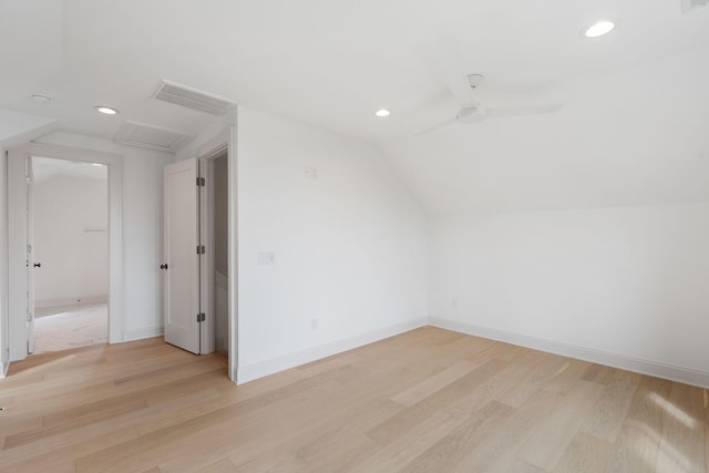 bonus room with light hardwood / wood-style flooring, lofted ceiling, and ceiling fan