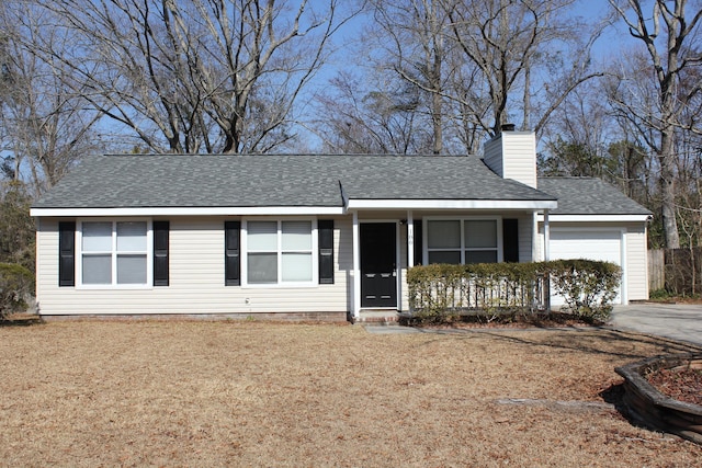 ranch-style home featuring a garage and a porch