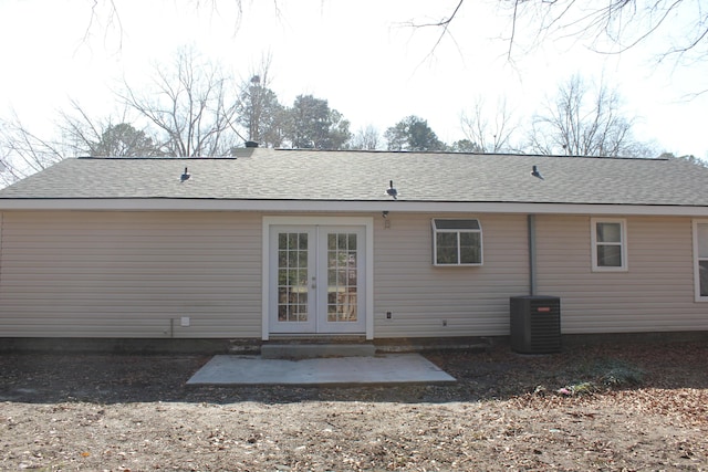 back of house featuring a patio, french doors, and central air condition unit