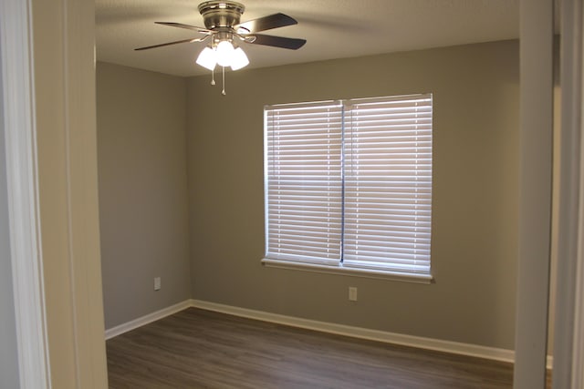 unfurnished room featuring ceiling fan, a textured ceiling, and dark hardwood / wood-style flooring