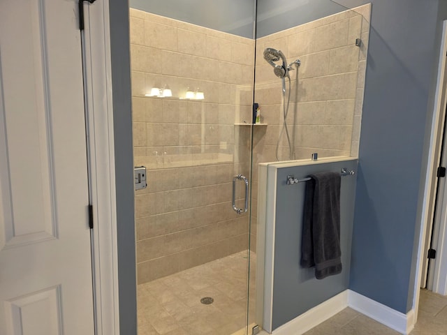 133 Wando Reach Rd, Wando, SC 29492 - full bathroom with a stall shower, pet washing area, tile patterned flooring, and baseboards