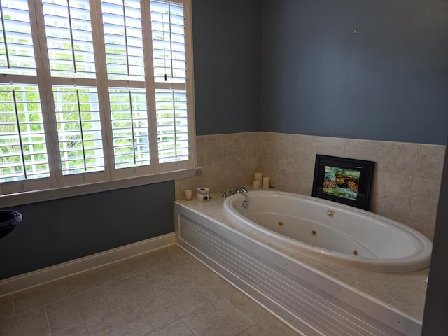 133 Wando Reach Rd, Wando, SC 29492 - bathroom with a whirlpool tub, a fireplace, and tile patterned flooring