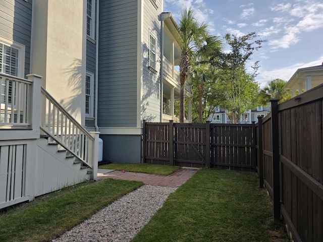 133 Wando Reach Rd, Wando, SC 29492 - view of yard with stairway and a gate