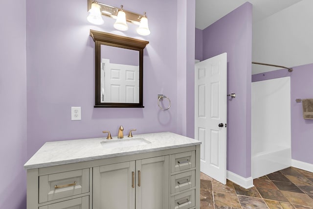 133 Wando Reach Rd, Wando, SC 29492 - full bath with baseboards, vanity, stone finish flooring, and shower / bathtub combination