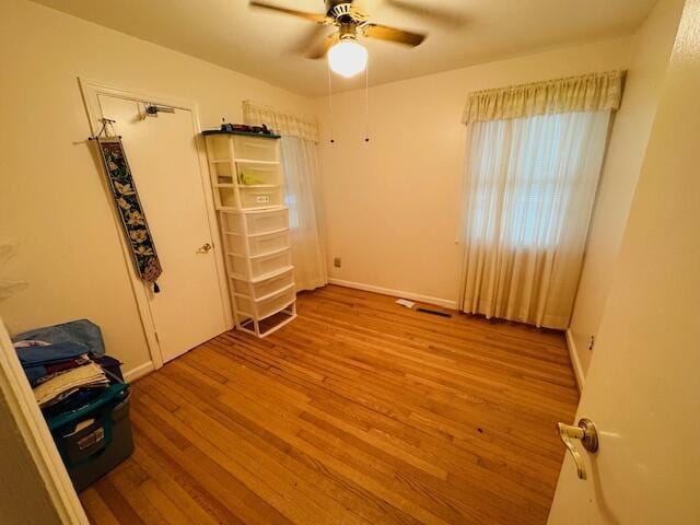 interior space featuring ceiling fan and light hardwood / wood-style flooring