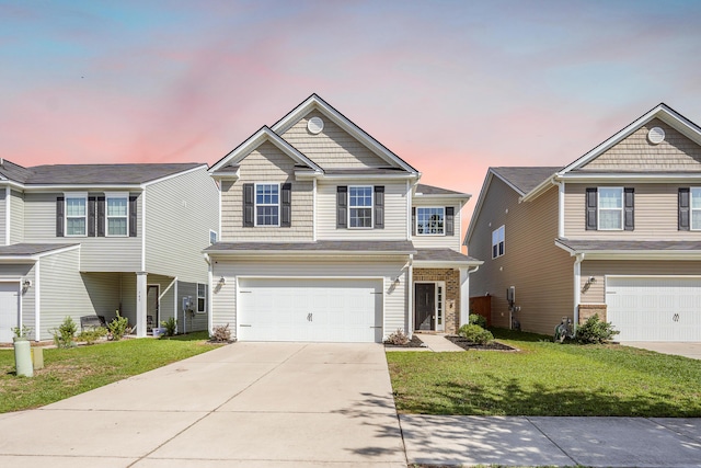 743 Redbud Ln, Summerville, SC 29486 - view of front facade with concrete driveway, a front yard, and a garage