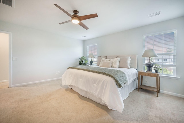 743 Redbud Ln, Summerville, SC 29486 - bedroom with carpet floors, multiple windows, baseboards, and a ceiling fan