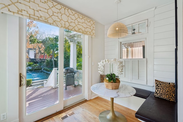 doorway to outside featuring hardwood / wood-style flooring