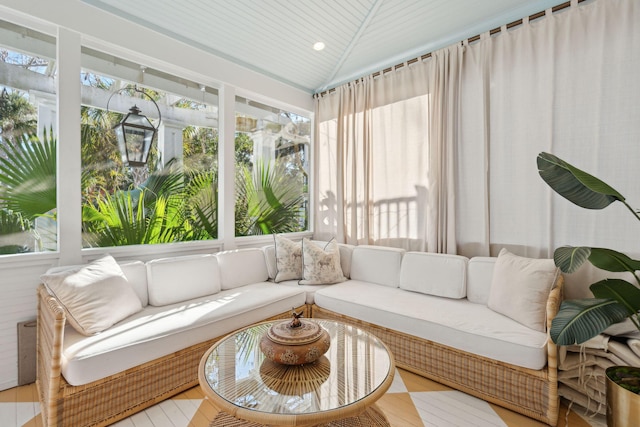 sunroom / solarium with lofted ceiling