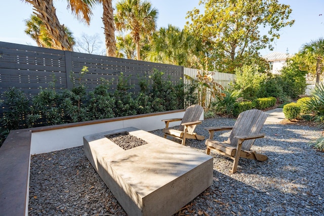 view of patio featuring an outdoor fire pit