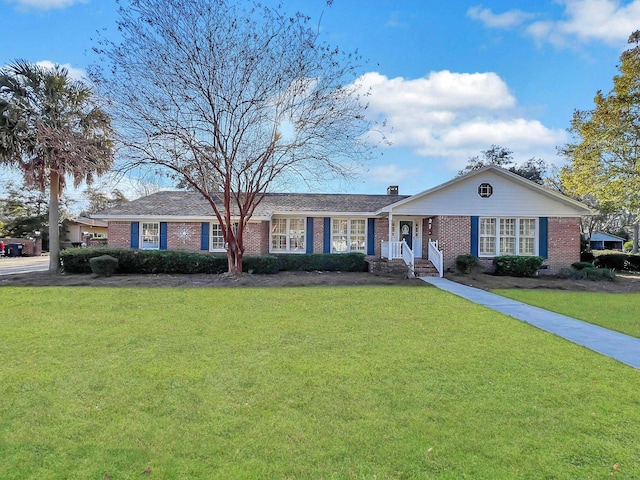 ranch-style house with a front lawn