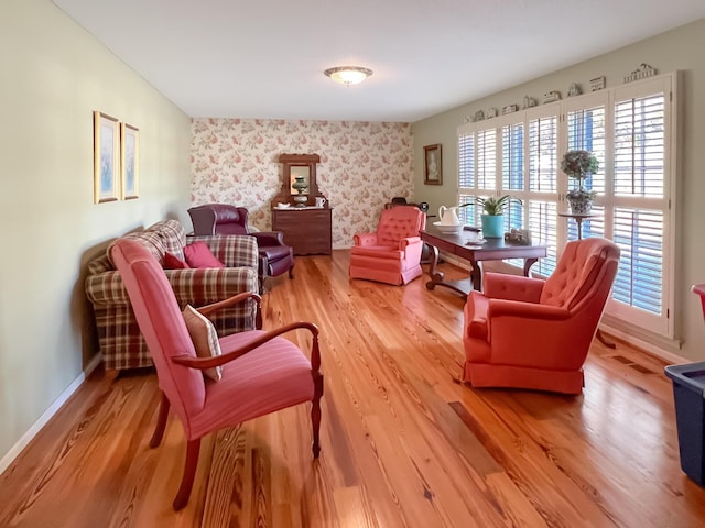 living area featuring hardwood / wood-style floors