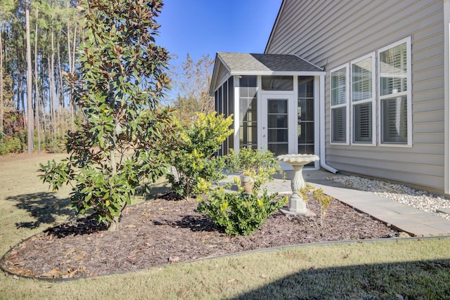 view of yard with a sunroom
