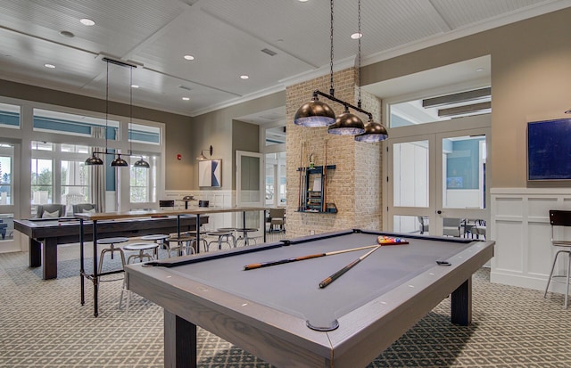 recreation room with pool table, carpet, and crown molding