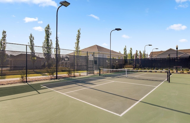 view of sport court with fence and community basketball court