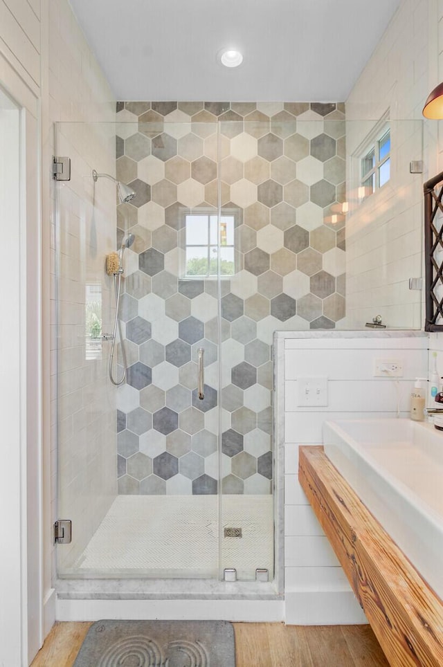11 Francis St, Charleston, SC 29403 - full bath featuring a stall shower, wood finished floors, healthy amount of natural light, vanity, and recessed lighting