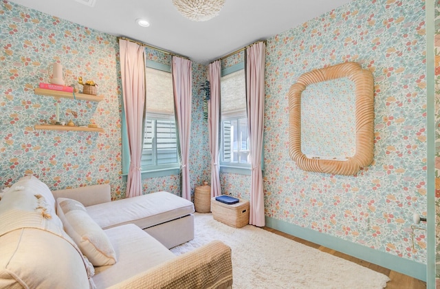 11 Francis St, Charleston, SC 29403 - bedroom featuring wood finished floors, wallpapered walls, baseboards, and recessed lighting