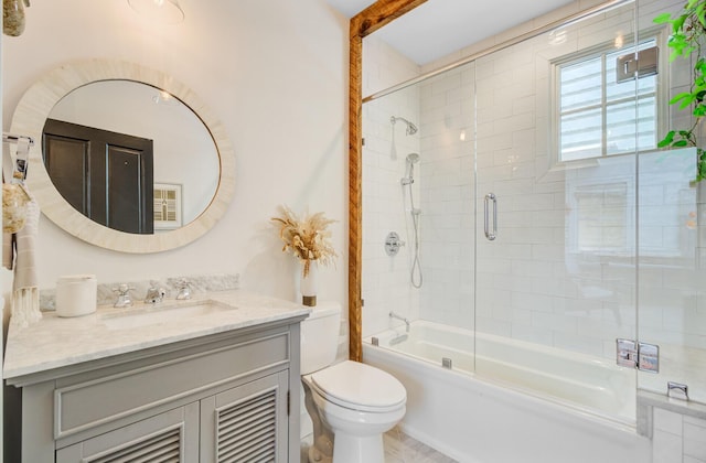 11 Francis St, Charleston, SC 29403 - full bathroom featuring toilet, vanity, and bath / shower combo with glass door